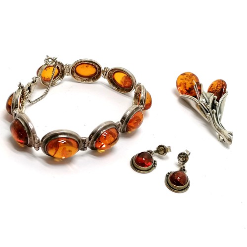 487 - Silver amber bracelet, pair of earrings & brooch - total weight 38g