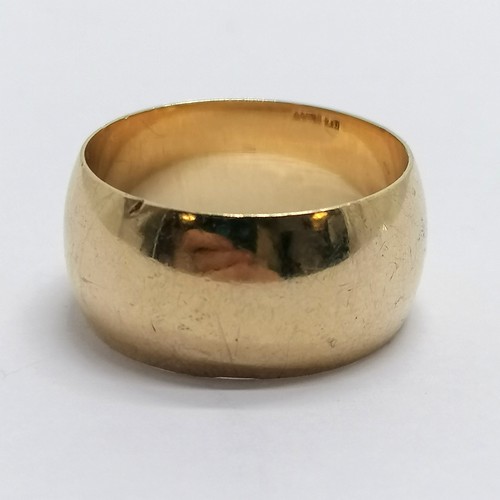 491 - 9ct hallmarked gold wide band ring - size R½ & 8.3g