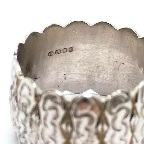 498 - 18ct hallmarked white gold wide band with engraved decoration - size Q & 11.6g - SOLD ON BEHALF OF T... 