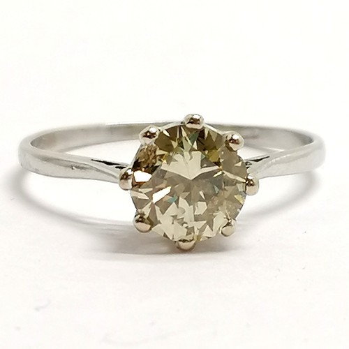 527 - Indistinctly marked platinum champagne diamond solitaire ring - size P½ & 2.5g total weight ~ stone ... 