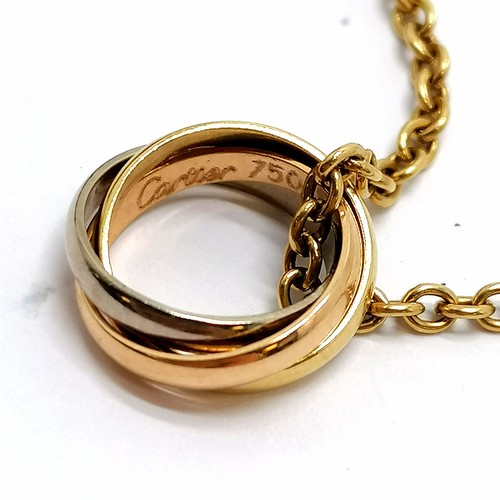 530 - Cartier 18ct marked gold 40cm chain with tri-coloured linked ring pendant (CU8568) in a Cartier box ... 