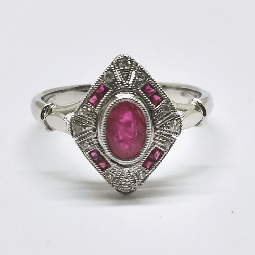 533 - 18ct marked white gold ruby & diamond Art Deco style ring - size O½ & 3.6g total weight