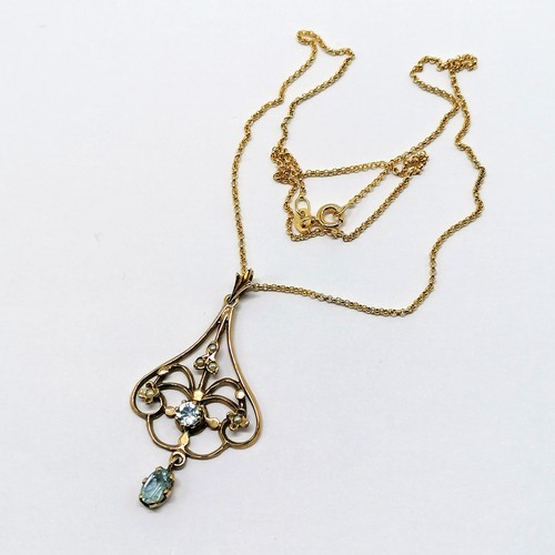 537 - 9ct hallmarked gold Edwardian style pendant set with aquamarine & seed pearls on a 9ct hallmarked 40... 