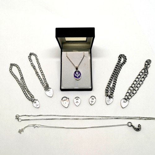 542 - Qty of silver jewellery inc curled skeletal hand pendant on chain, 4 charm type bracelets (with padl... 