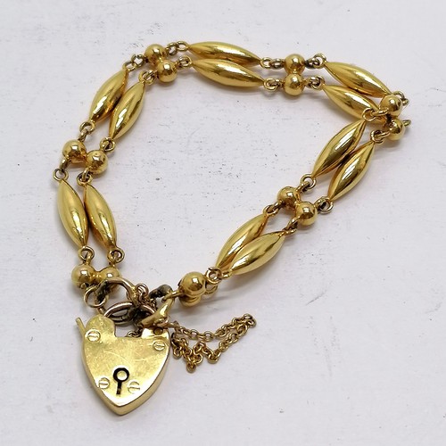 596 - Unusual antique padlock bracelet with double torpedo and bead link detail - 10.4g ~ in worn conditio... 