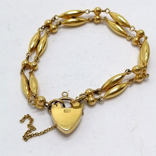 596 - Unusual antique padlock bracelet with double torpedo and bead link detail - 10.4g ~ in worn conditio... 