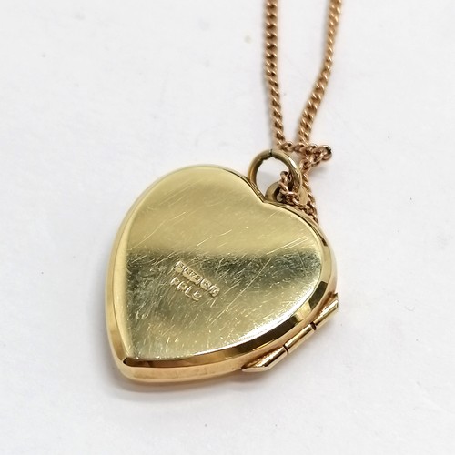 597 - 9ct hallmarked gold heart shaped locket on a 9ct rose gold 46cm chain ~ total weight 6.4g