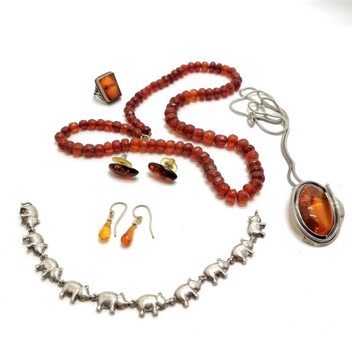 617 - Qty of amber and silver jewellery inc pig bracelet, pendant brooch on chain, pendant (not marked), f... 