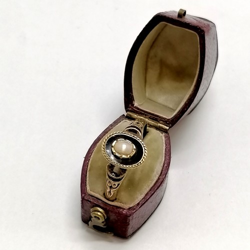 631 - Antique mourning ring in unmarked gold with blue enamel detail and cut pearls to centre in original ... 