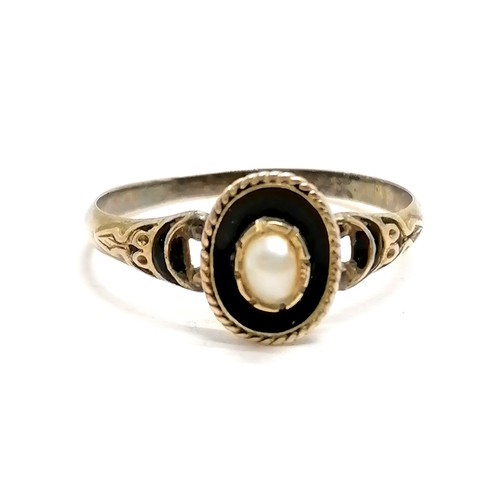 631 - Antique mourning ring in unmarked gold with blue enamel detail and cut pearls to centre in original ... 