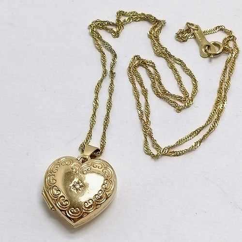 635 - 9ct hallmarked gold heart shaped locket set with a diamond on a 9ct hallmarked gold 44cm chain ~ tot... 