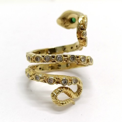 638 - Unmarked 18ct gold designer snake ring by AK set with emerald / diamonds & ruby eyes - size R & 16.4... 