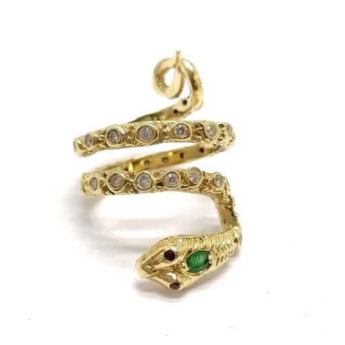 638 - Unmarked 18ct gold designer snake ring by AK set with emerald / diamonds & ruby eyes - size R & 16.4... 