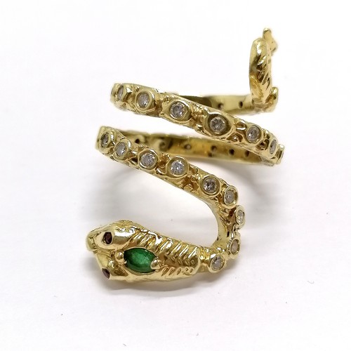 638 - Unmarked 18ct gold designer snake ring by AK set with emerald / diamonds & ruby eyes - size R & 16.4... 