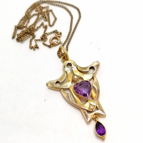 639 - Antique 9ct marked gold Art Nouveau pendant set with amethyst & pearl (4.5cm drop) on a gilt metal c... 