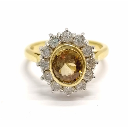 640 - 18ct hallmarked gold yellow tourmaline ? and diamond set cluster ring - size O½ & 6.6g total weight