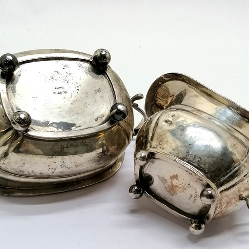 821 - Matched pair of silver cream & sugar with gadrooned edge & terminating on ball feet by C S Harris & ... 