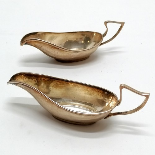 829 - 1932 (F/G) pair of Chester silver small sauce boats by Adie Brothers Ltd - 12cm across & 56g ~ both ... 