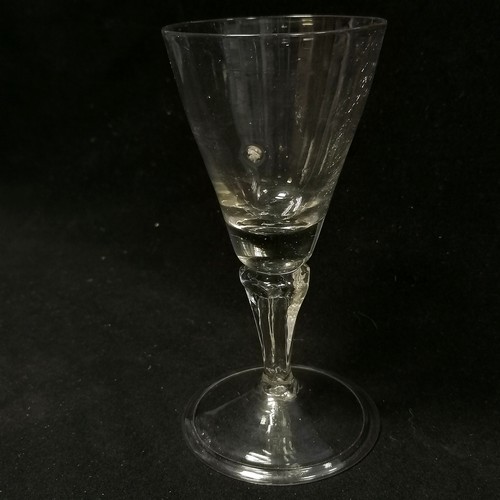 8 - RARE c.1720 wine glass with unusual moulded panel stem terminating on a folded footrim - 15cm high &... 