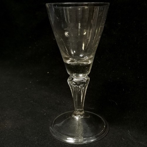 8 - RARE c.1720 wine glass with unusual moulded panel stem terminating on a folded footrim - 15cm high &... 