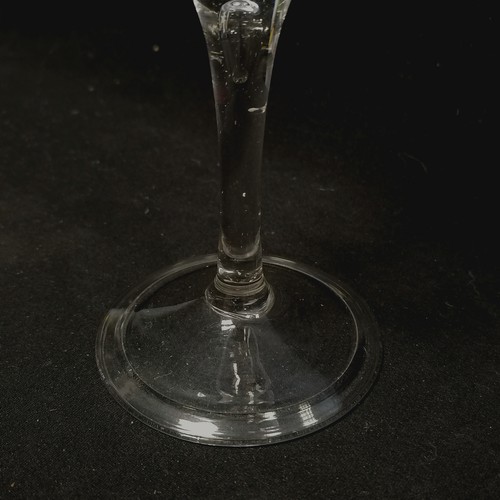 11 - Mid 18th century wine glass with folded footrim and unusual classical etched border to top and sport... 