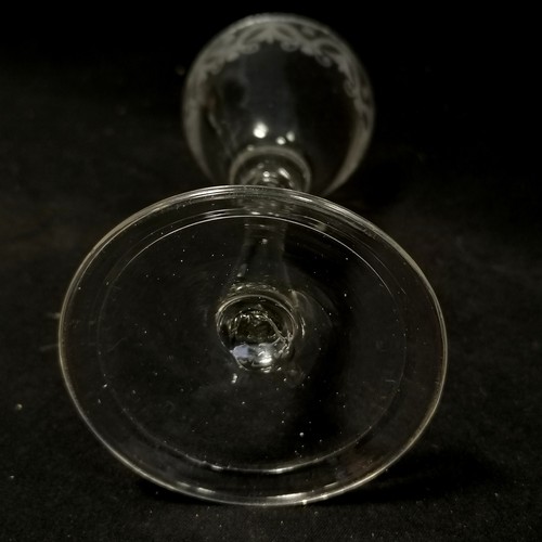 11 - Mid 18th century wine glass with folded footrim and unusual classical etched border to top and sport... 