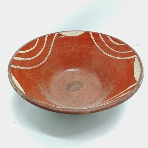 31 - Antique slipware bowl 33cm diameter. Has a hairline crack otherwise in good used condition