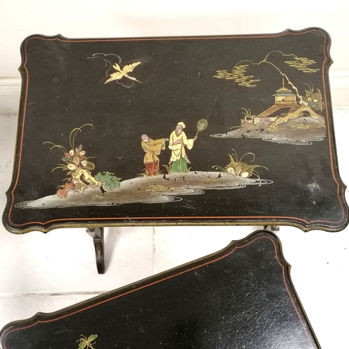 60 - Nest of Oriental lacquer tables with gilded scenes to the tops 54cm x 36cm x 63cm high. Some slight ... 