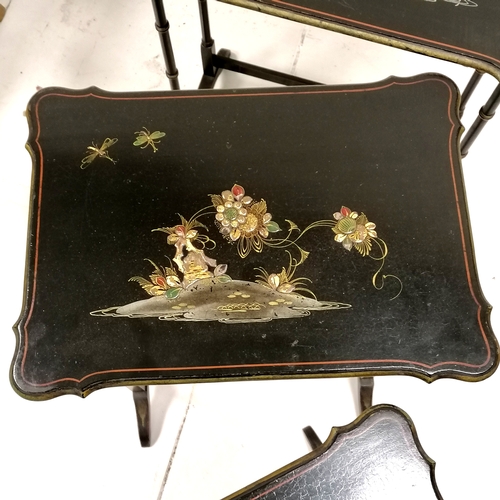 60 - Nest of Oriental lacquer tables with gilded scenes to the tops 54cm x 36cm x 63cm high. Some slight ... 