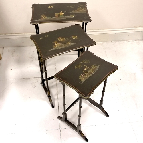 60 - Nest of Oriental lacquer tables with gilded scenes to the tops 54cm x 36cm x 63cm high. Some slight ... 