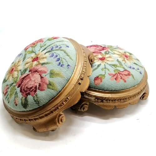 63 - Pair of antique giltwood circular stools upholstered with floral tapestry 36cm diameter.