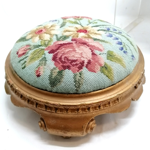 63 - Pair of antique giltwood circular stools upholstered with floral tapestry 36cm diameter.