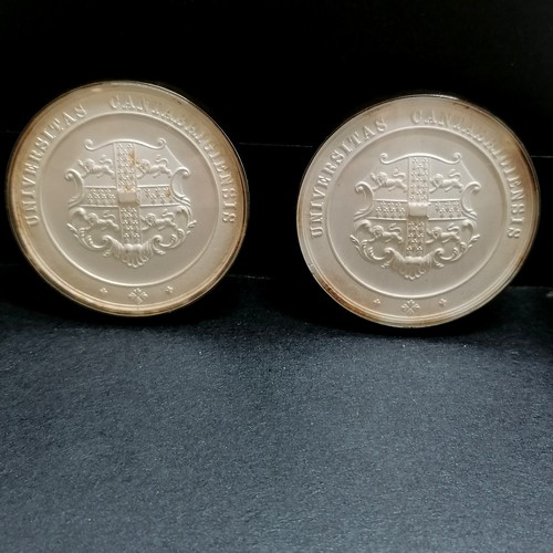 211 - 2 x Cambridge University sports medals (?) encapsulated in glass - 5cm diameter