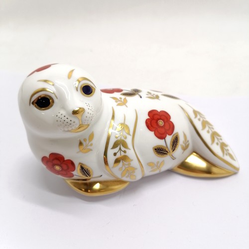 214 - Royal Crown Derby (gold seal) seal paperweight - 13cm long with no obvious damage