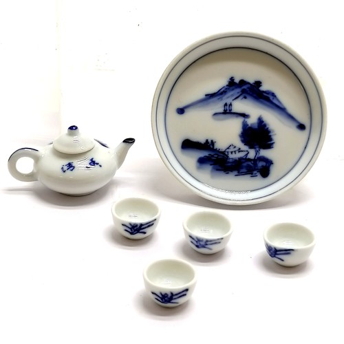 219 - Oriental miniature blue & white tea set on tray (7.8cm diameter) - no obvious damage