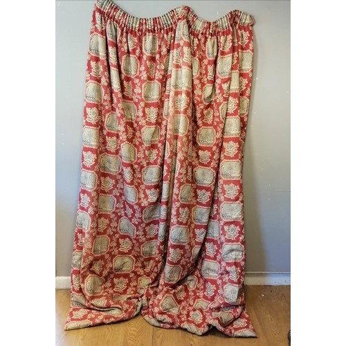 438 - Pair of terracotta coloured interlined curtains with blue and white figural scene panels each curtai... 