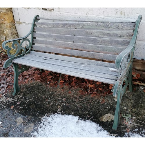 442 - Cast iron and wooden slatted bench - 126cm wide x 64cm deep x 78cm high ~ 2 slats a/f