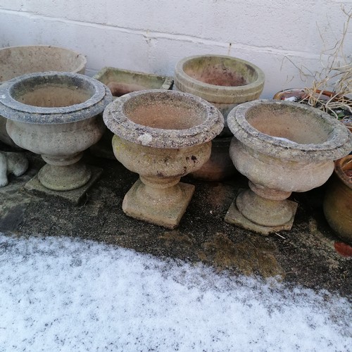 447 - Qty of planters comprising 1 glazed  & 8 x concrete (3 are urn shaped - 42cm high x 39cm diameter)