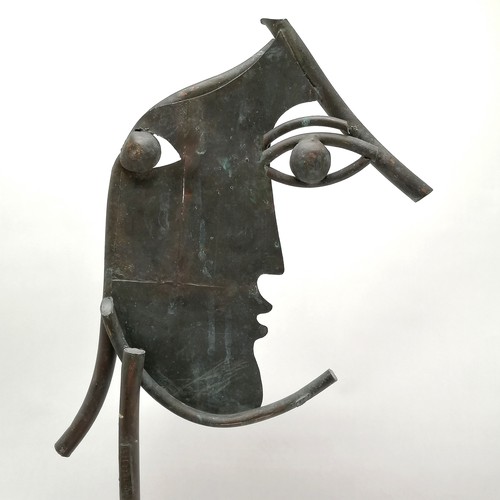 14 - Contemporary bronze sculpture of a face mounted on a wooden block (68cm high) by Jon Ellis (1939-201... 