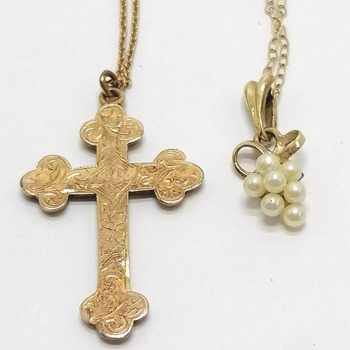 521 - Antique 9ct marked gold cross (has dents) on a 9ct gold 44cm chain (has metal replacement ring) t/w ... 