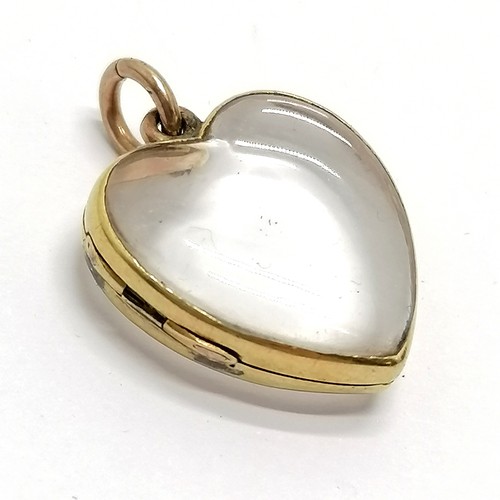 540 - Antique unmarked yellow metal Essex crystal heart locket - 2.5cm with no obvious damage