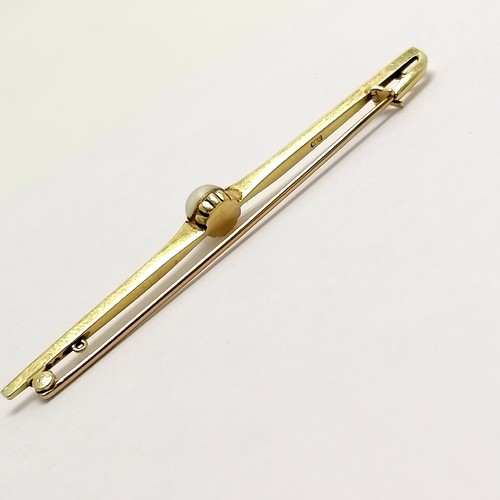 545 - Antique 15ct marked gold bar brooch set with a pearl with unusual safety catch - 6.5cm long & 3.7g t... 