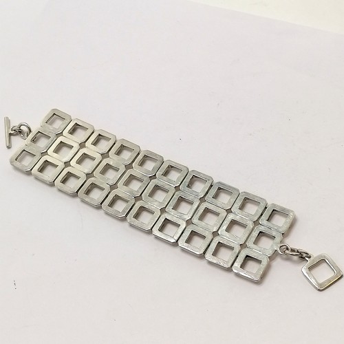 585 - Unusual 925 silver marked triple row bracelet - 18cm long & 3.6cm wide & 64g - SOLD ON BEHALF OF THE... 