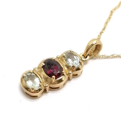 608 - 9ct hallmarked gold garnet + white stone pendant (2.5cm) on a 9ct marked gold 44cm chain - total wei... 