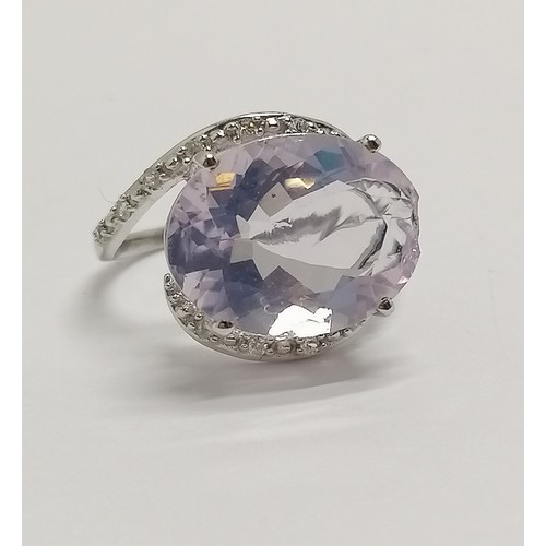 618 - 9ct hallmarked white gold lavender quartz (8.56cts & 16mm x 12mm) ring set with 14 white zircon ston... 