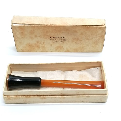 642 - Vintage Cartier box (a/f) containing a vintage sprung cheroot / cigarette holder - 9.8cm long