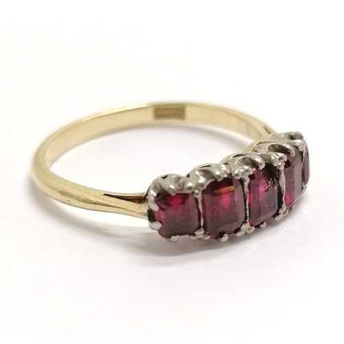 649 - 18ct marked gold ruby 5 stone set ring - size Q & 3.3g total weight ~ 3 stones are a/f