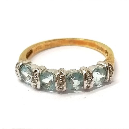 662 - 9ct hallmarked gold blue stone (aquamarine?) & diamond set ring - size K & 1.8g total weight