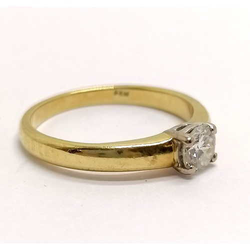 663 - 18ct hallmarked gold diamond (4.5mm in diameter) solitaire ring - size M & 3.2g total weight