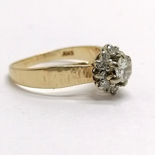 670 - 14ct marked ring (with 18ct gold head) diamond (4mm) ring with 12 diamonds surrounding - size K & 2.... 